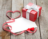 Blank valentines greeting card and small red gift box