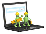 Two builders and laptop