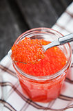 Spoon of red caviar