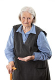 Senior woman holding medications over white