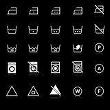 Laundry icons with reflect on black background