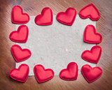 red hearts on vintage  paper background with copyspace