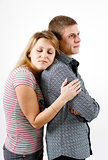 young woman hugging man