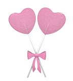 Two pink heart lollipops