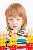 Child Counting on Colorful Wooden Abacus 