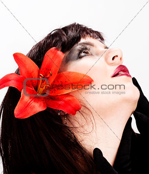 Portrait of a Beautiful Young Woman with Red Lily 