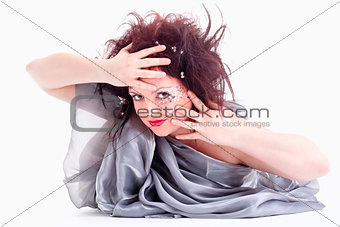 Portrait of Young Woman Lying on the Floor Looking 