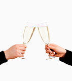 Two Hands Holding Glasses of Champagne Toasting 