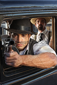 Muscular Gangster Shooting Gun