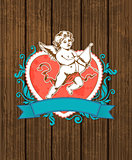 Wooden background with red heart