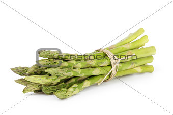 uncooked green asparagus tied with twine