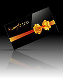 Glossy gift card with golden bow and ribbon