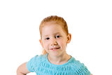 Friendly redhead elementary age girl in blue top