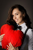 Girl with Heart-Shaped Pillow