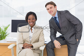 Business colleagues sitting in office