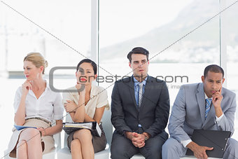 Business people waiting for job interview in office
