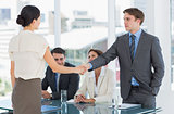 Handshake to seal a deal after a job recruitment meeting