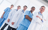 Portrait of doctors standing in a row at hospital