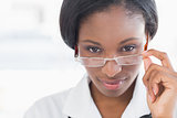 Closeup portrait of a female doctor with eye glasses