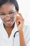 Closeup portrait of a female doctor with eye glasses