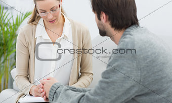 Man in meeting with a financial adviser