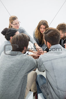 Group therapy in session sitting in a circle