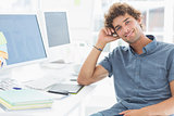 Smiling casual man in a bright office