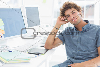 Smiling casual man in a bright office