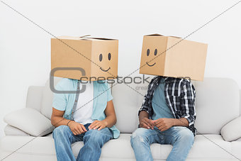 Men with happy smiley boxes over faces