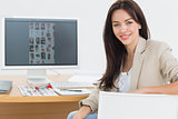 Female artist at desk with computer in the office