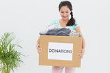 Woman with clothes donation