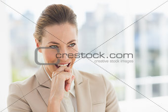 Closeup of a young businesswoman looking away