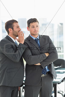 Young well dressed businessmen in discussion