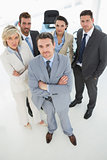 Confident business team standing in office