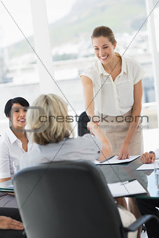 Executives shaking hands during a business meeting