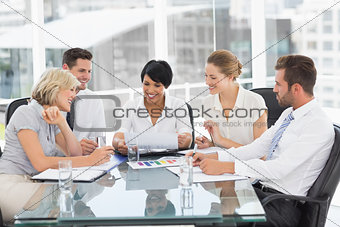 Young well dressed business people in meeting