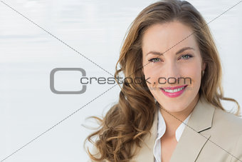 Closeup portrait of a smiling young businesswoman