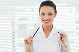 Beautiful confident female doctor with stethoscope