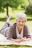 Portrait of a smiling senior woman at park