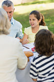 Family dining at outdoor table