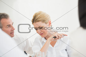 Happy businesswoman listening during a meeting