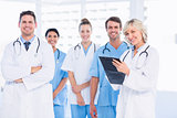Confident happy group of doctors at medical office