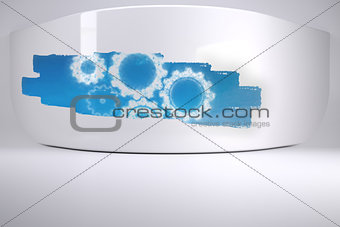 Abstract screen in room showing cogs and wheels