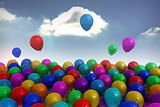Many colourful balloons sky background