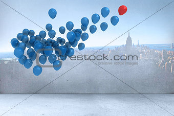 Many colourful balloons in room with city on wall