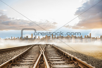 Railway tracks leading to city