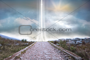 Rocky path leading to light beam