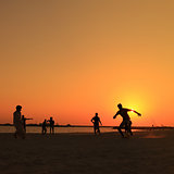 Football at Jumeira beach in Dubai during sunset.