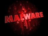 Malware on Dark Digital Background.