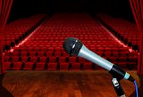 Microphone on Stage Facing Empty Auditorium Seats